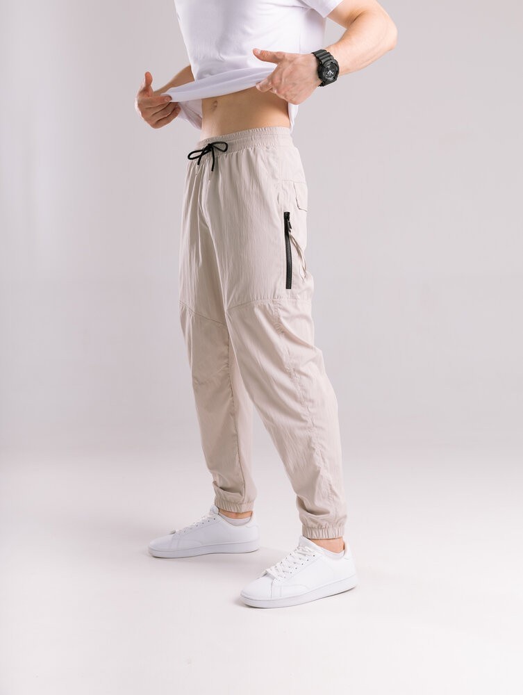 Бежеві чоловічі джогери. Джогери плащівка спорт чоловічі Pobedov Yoxo. Штани джогери з кишенями, POB_00000008861